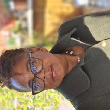 Rosemarie Jenkins, Housing 21 Board Member, looks into the camera and smiles
