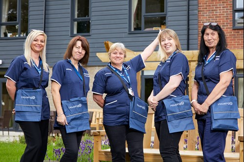 Care Workers enjoying themselves outside a Housing 21 scheme