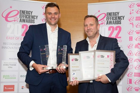 Ashley Norwood and Jason Cole collecting the awards