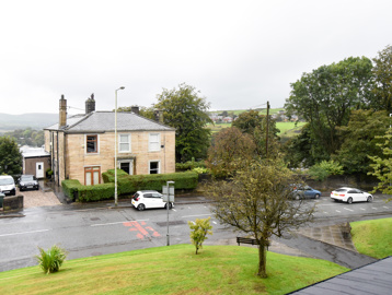 Looking out from Barker Court to views of the countryside between neighbouring houses