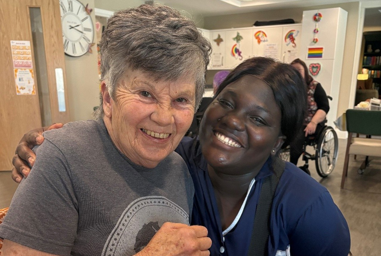 Resident Janet with a care worker