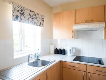 Corner of a kitchen within a resident's apartment