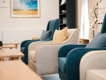 chairs and a table from the scheme communal area