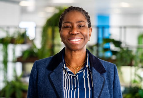 Board Member Professor Bola Owolabi smiles into the camera