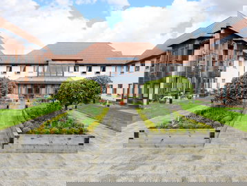 Large planters in the centre of the courtyard at Mere View Court