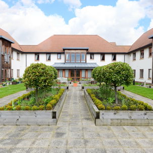 Large planters in the centre of the courtyard at Mere View Court