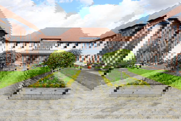 Large planters in the centre of the courtyard at Mere View Court