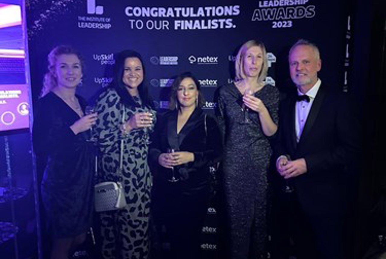 Housing 21 colleagues celebrating at the Leadership Awards 2023 in smart evening wear.