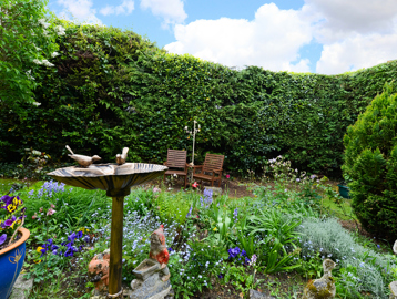 Communal garden with bird bath