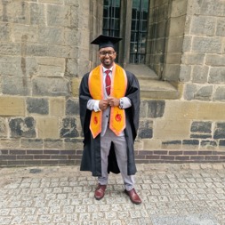 Employee, Shaf Hussain at graduation after completing a level five, University Certificate of Professional Development in Management at DeMontford University