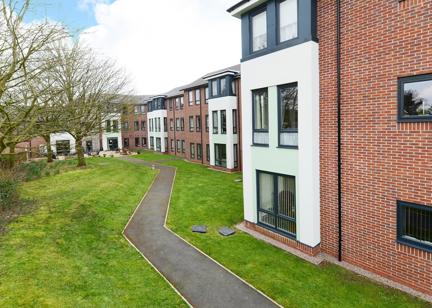 Pathway running alongside the gardens to the side of Lea Court