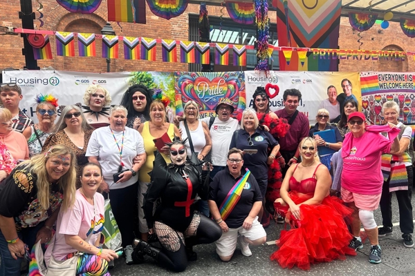 Housing 21 Employees And Residents At Manchester Pride 2025 In Front Of A Float