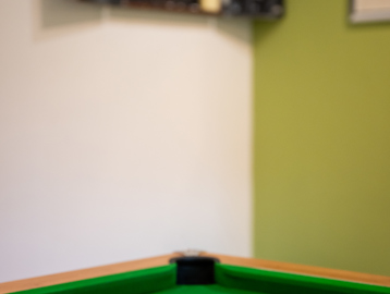 Pool table and dart board
