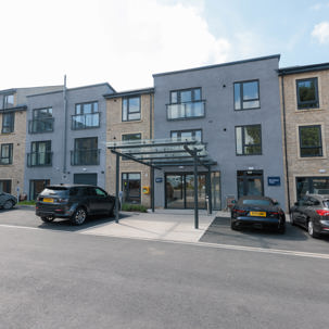 Front entrance of Bowland View, showing the front of the scheme with a car park