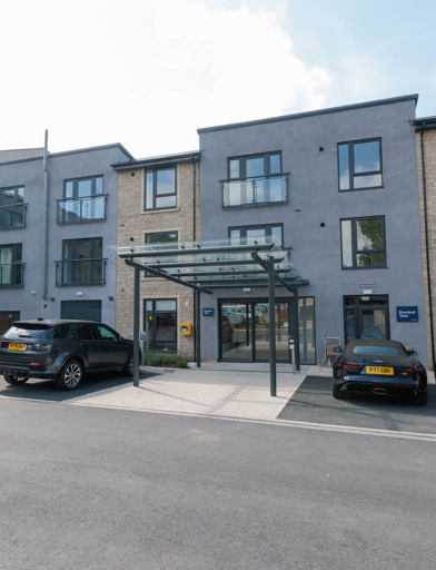 Front entrance of Bowland View, showing the front of the scheme with a car park