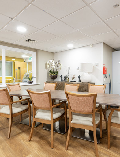 a communal kitchen with dining table