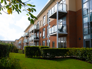 A view from the communal gardens looking alongside the main building