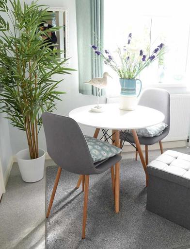 A stylish kitchen dining area in an apartment at Goodman Court 