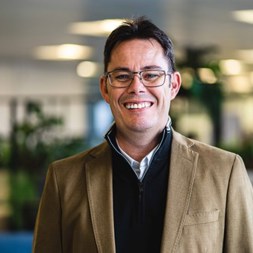 Deputy Chief Executive Tony Tench smiles into the camera