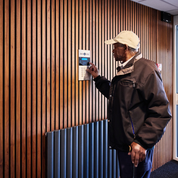 Resident using touch screen device