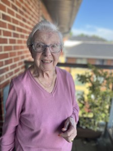 Resident, Kathleen Enjoying The Spring Sunshine On Her Balcony