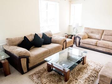 Dennis Sneezum Court Apartment Living Room