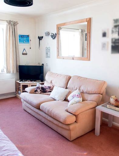Inside living room of a resident's apartment with pink colour scheme