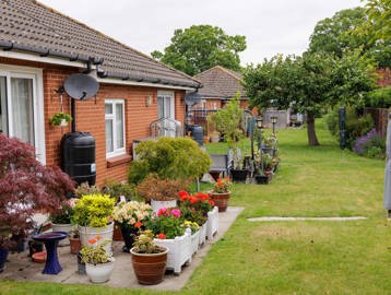 Gardens of the bungalows at Beccles Court
