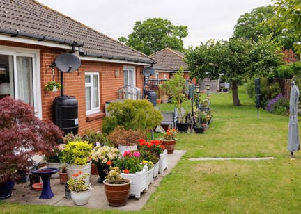 Gardens of the bungalows at Beccles Court