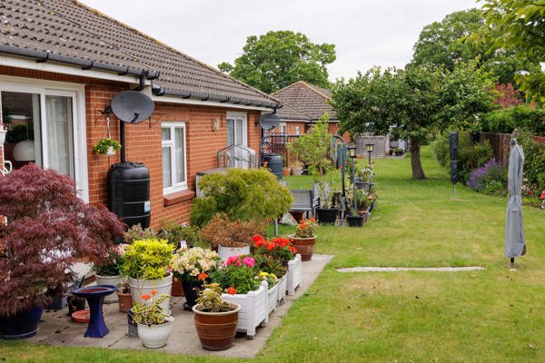 Gardens of the bungalows at Beccles Court