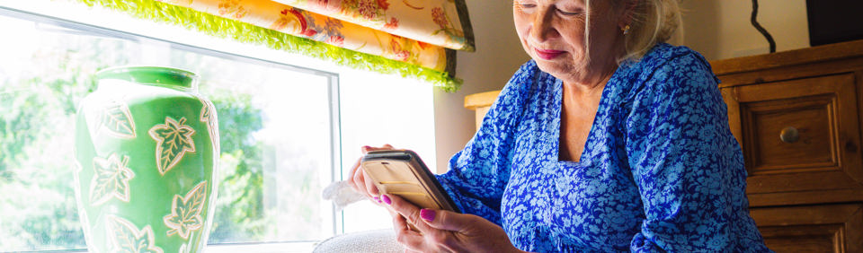 Resident scrolling on a mobile phone 