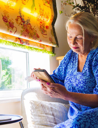 Resident scrolling on a mobile phone 
