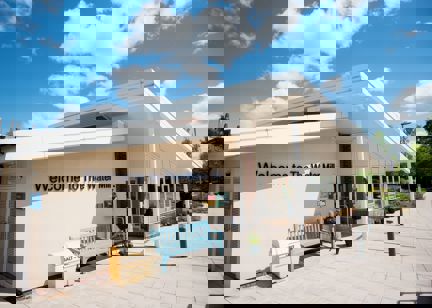 Large welcome sign to the front entrance of The Water Mill