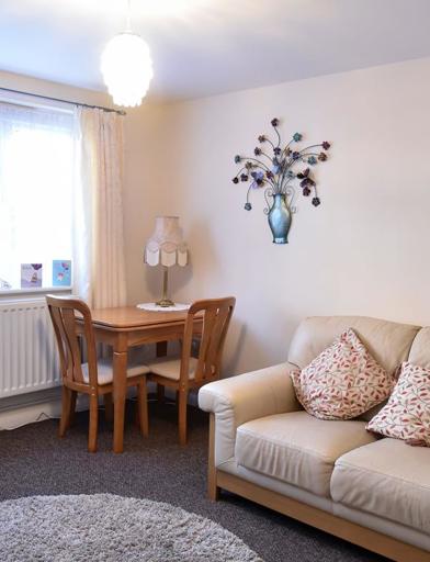 Inside the living room of a resident's apartment 