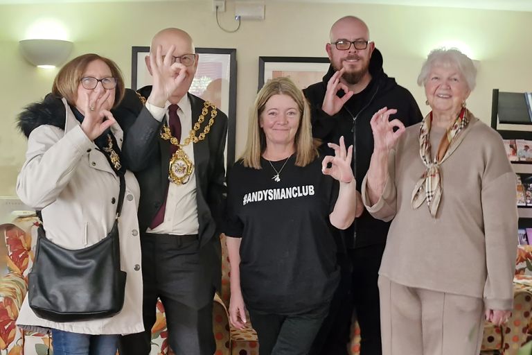 Group photo of the Mayor of Oldham, Local Manager Suzanne, Resident Sheila and Luke from Andy's Man Club