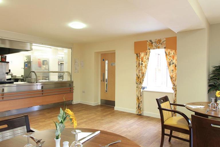 Cafe/bistro area with dining tables and chairs