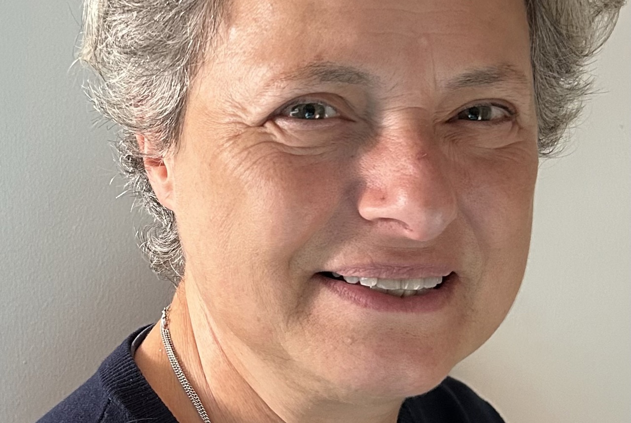 a woman looking at the camera