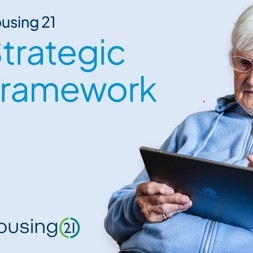 Front cover of the Strategic Framework with a resident looking at an iPad