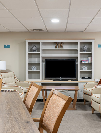 a communal lounge with media wall 