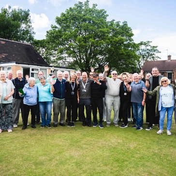 Group of residents smiling from Oldham