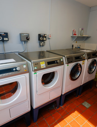 Laundry room with four washing machines 