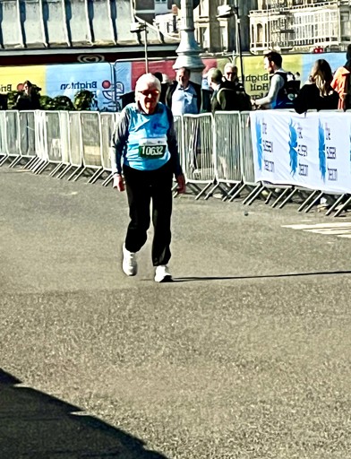 Judith running in the marathon, wearing a running bib number: 10632  