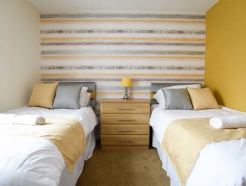 John Quinn Court Twin Bedroom