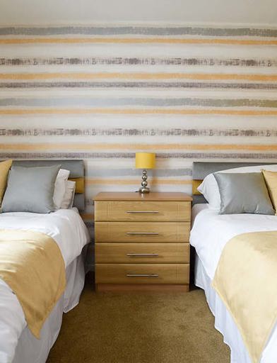 John Quinn Court Twin Bedroom