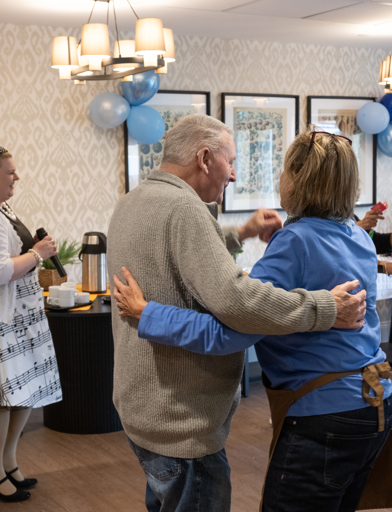 Residents dancing in the communal lounge 