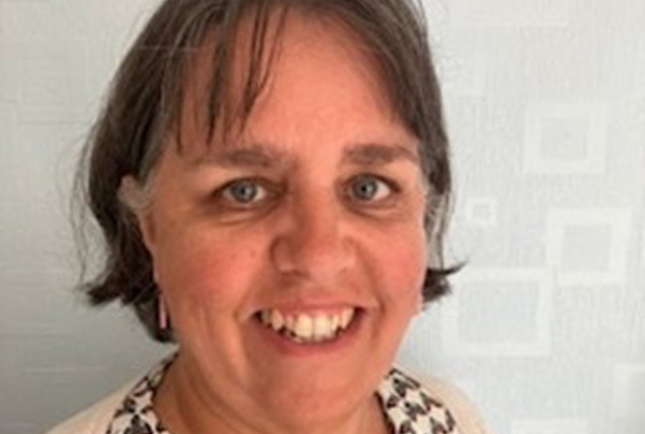 Headshot of a smiling woman