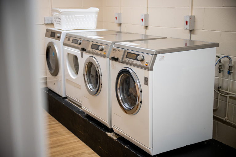 Laundry room with washing machines