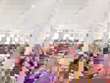 Close up of some of the armchairs in the residents' lounge