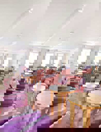Close up of some of the armchairs in the residents' lounge