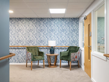 a seating area in a hallway